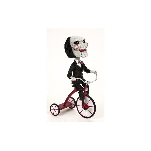 Figura neca saw head knocker puppet on tricyclesue)